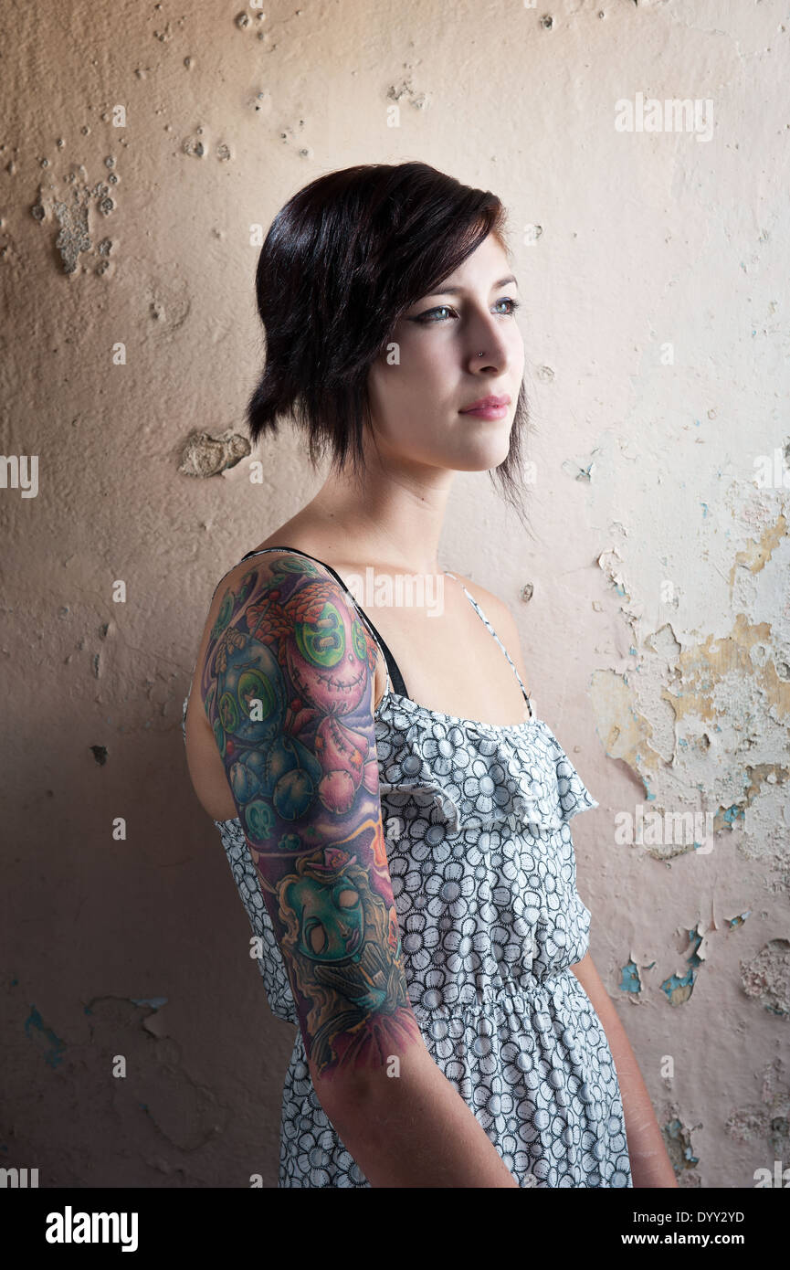 Gorgeous young female model with tattoo. Stock Photo