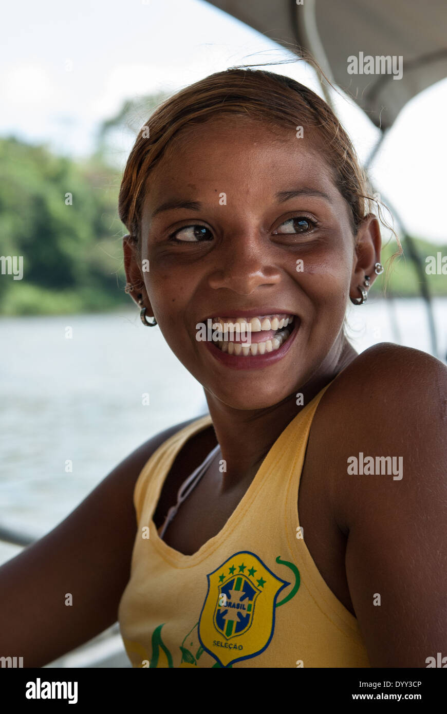 Pakissamba Village (Juruna), Xingu River, Para State, Brazil. Girl with Brasil football team T shirt. Stock Photo