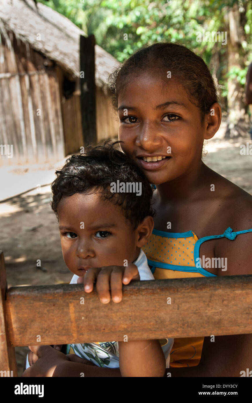 Pakissamba Village (Juruna), Xingu River, Para State, Brazil. A Juruna Indian girl and her brother. The Xingu River, which provides transport and fish for the Juruna, will be reduced to a trickle when the Belo Monte dam is built. Stock Photo
