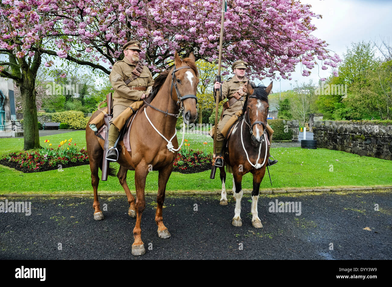Two men dressed as WW1 soldiers from the Ulster Volunteers (UVF) riding horses. Stock Photo