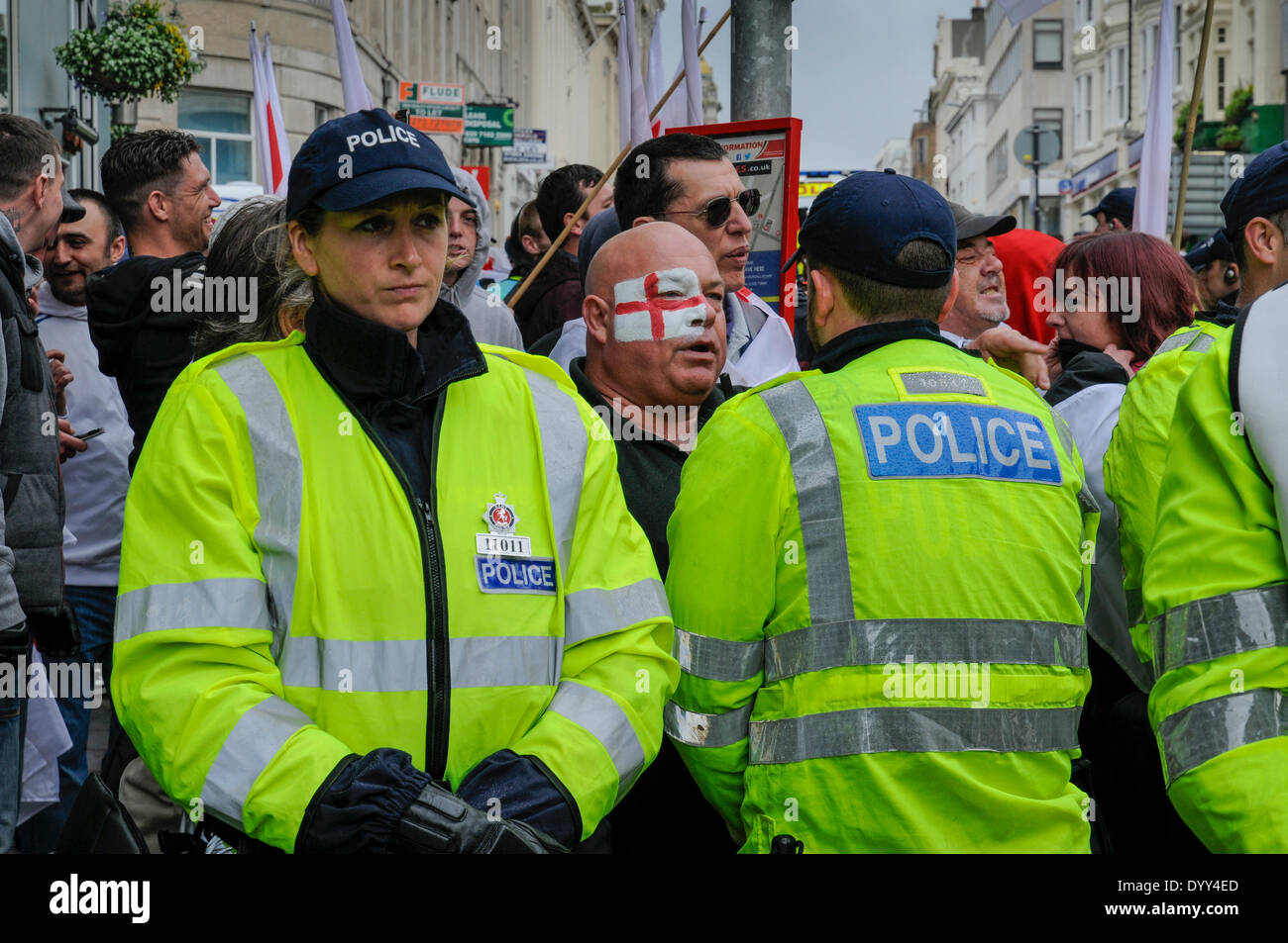 Brighton, East Sussex, UK..27th April 2014..About 150 marchers descended on Brighton. Completely outnumbered by those opposed to the march Police did a commendable  job keeping the two factions apart. Stock Photo