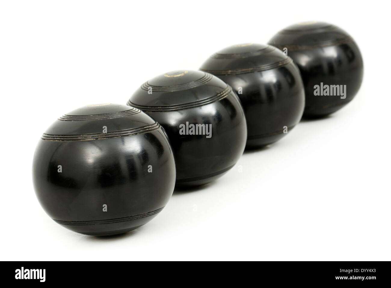 Set of vintage lawn bowls, size 5, made by R.G. Lowrie, Glasgow, Scotland (Official BIBC A85) Stock Photo
