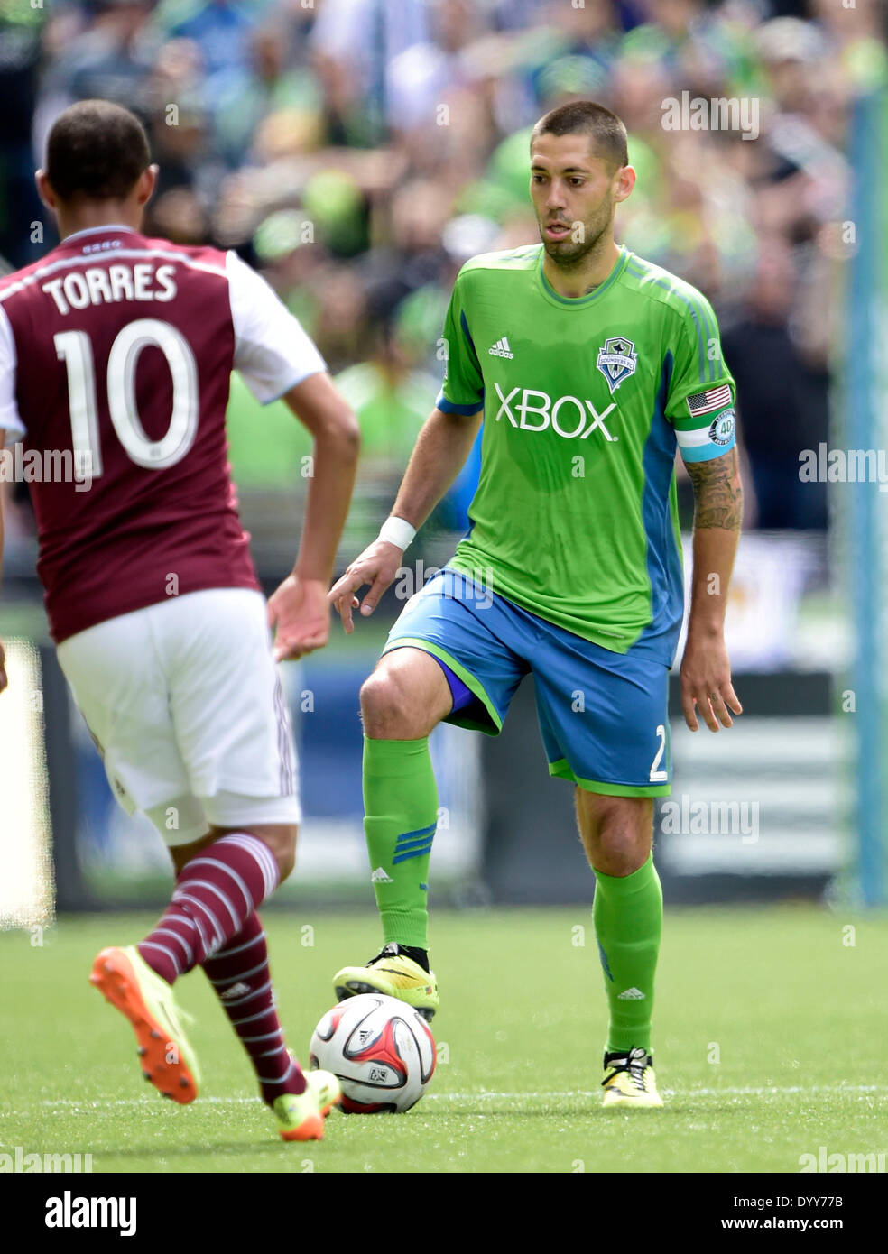 April 26, 2014. Seattle Sounders FC forward Clint Dempsey #2 controls the ball while defended by Colorado Rapids forward Gabriel Torres #10 at CenturyLink Field in Seattle, WA. Seattle Sounders FC defeats the Colorado Rapids 4 - 1.George Holland/Cal Sport Media Stock Photo