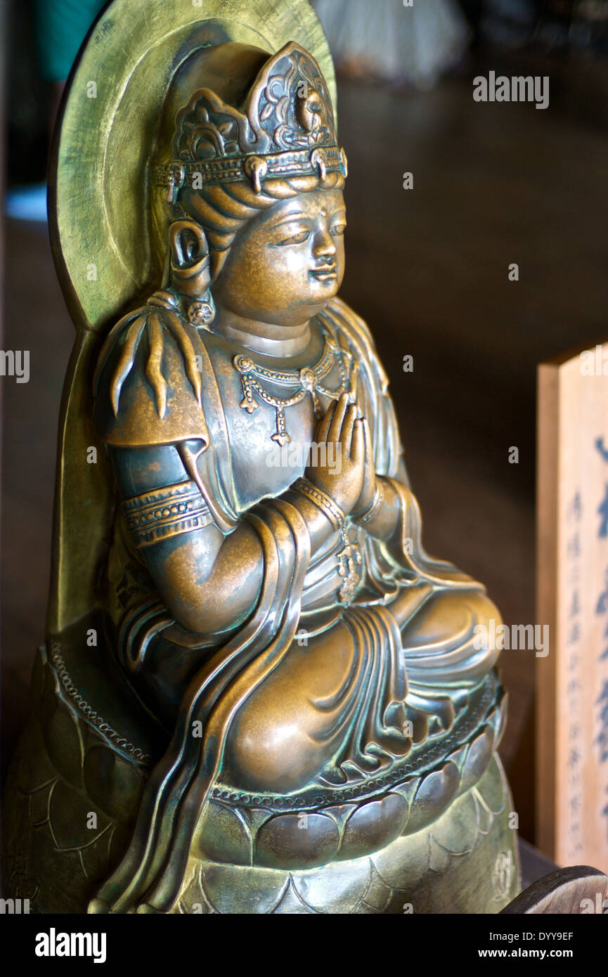 Buddhist metal statue at Kiyomizu-dera temple. Stock Photo