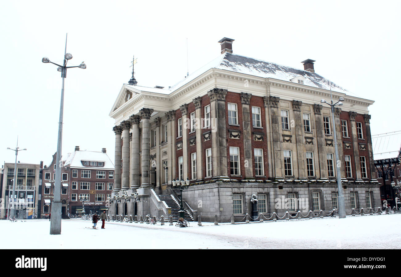 Grote Markt (Main Square) in the historic centre of Groningen, The Netherlands with city hall (stadhuis) in winter setting Stock Photo