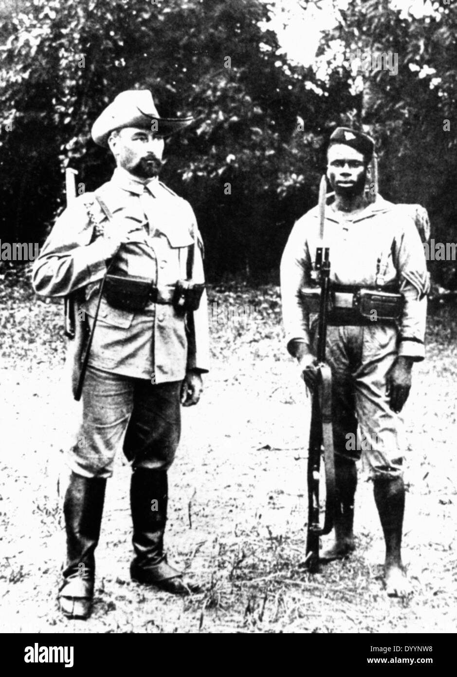 A German soldier and an Askari in Cameroon, around 1900 Stock Photo