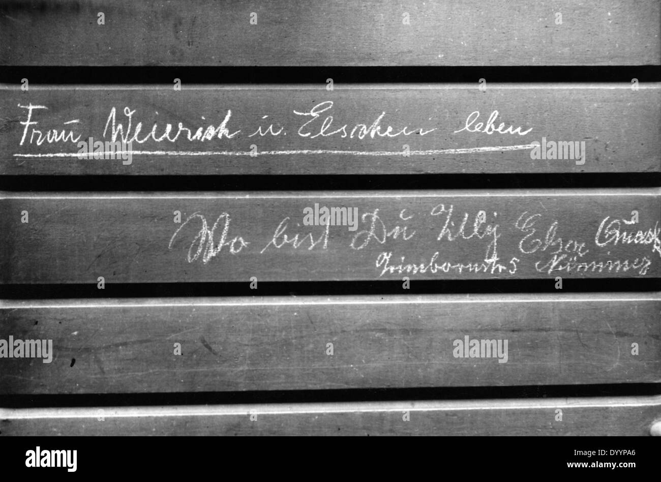 Bench with names of missing people in Cologne, 1943 Stock Photo