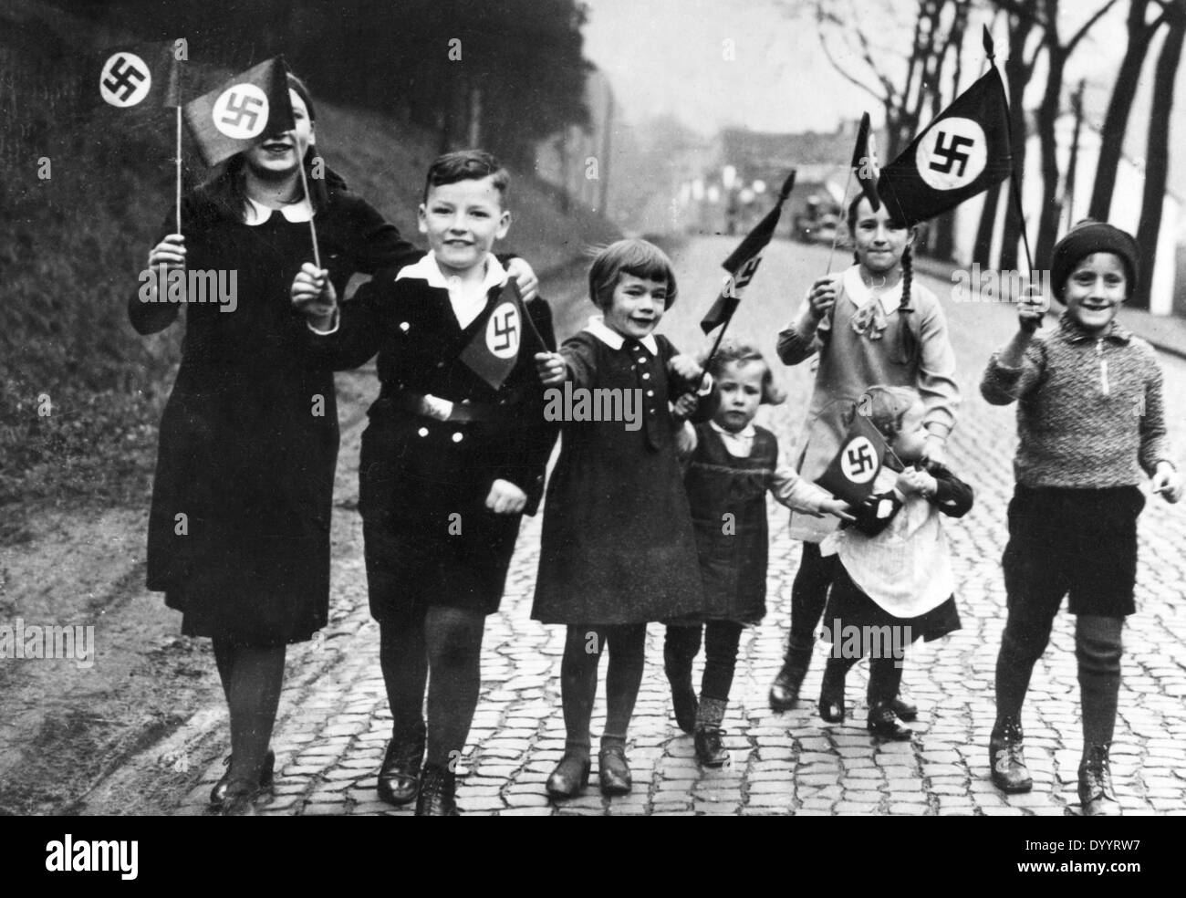Children with swastika flags, 1933 Stock Photo - Alamy Children with swastika flags, 1933 Stock Photo - Alamy