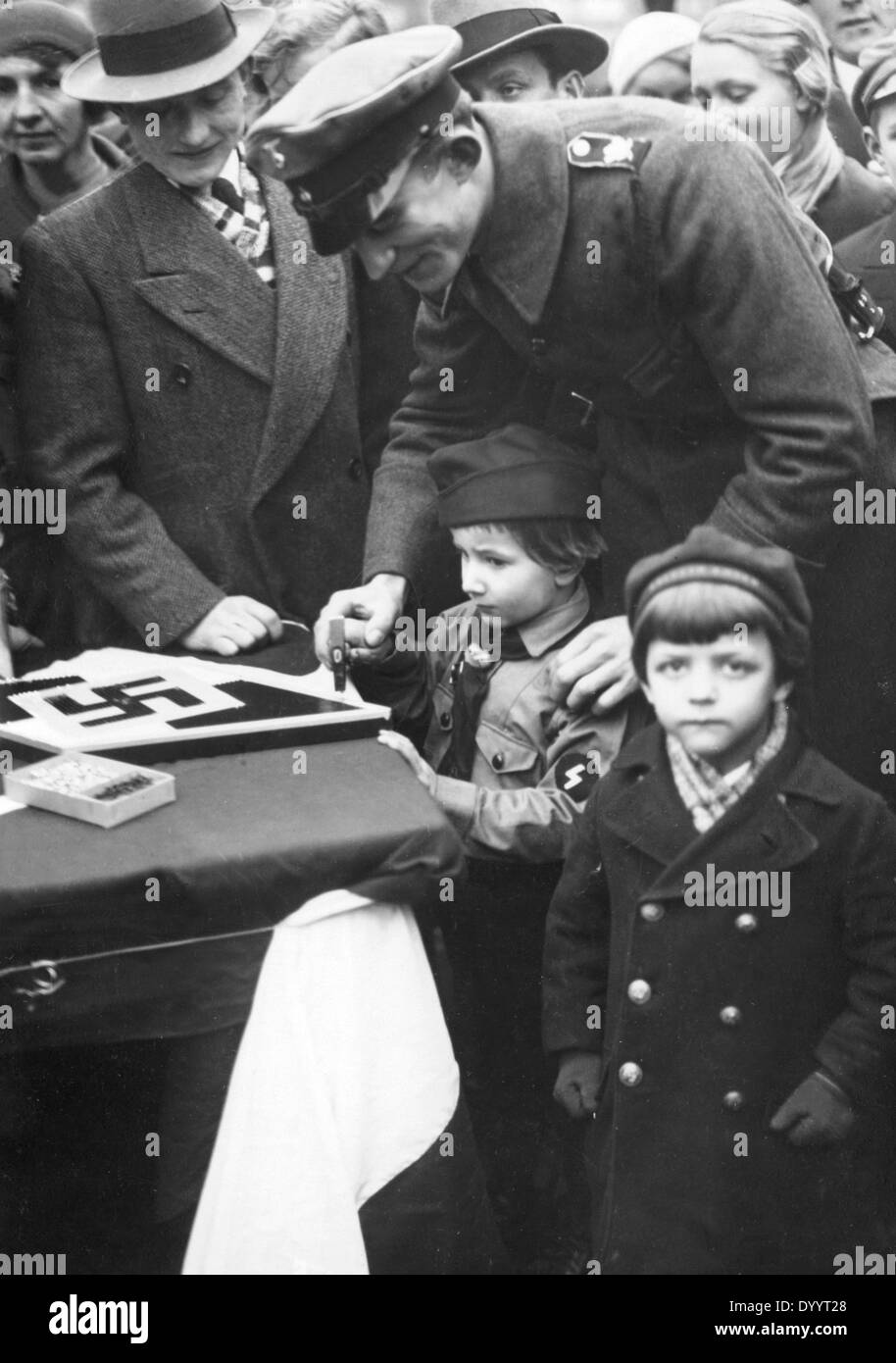 Nailing of the Hitler Youth sign on Potsdamer Platz, 1933 Stock Photo