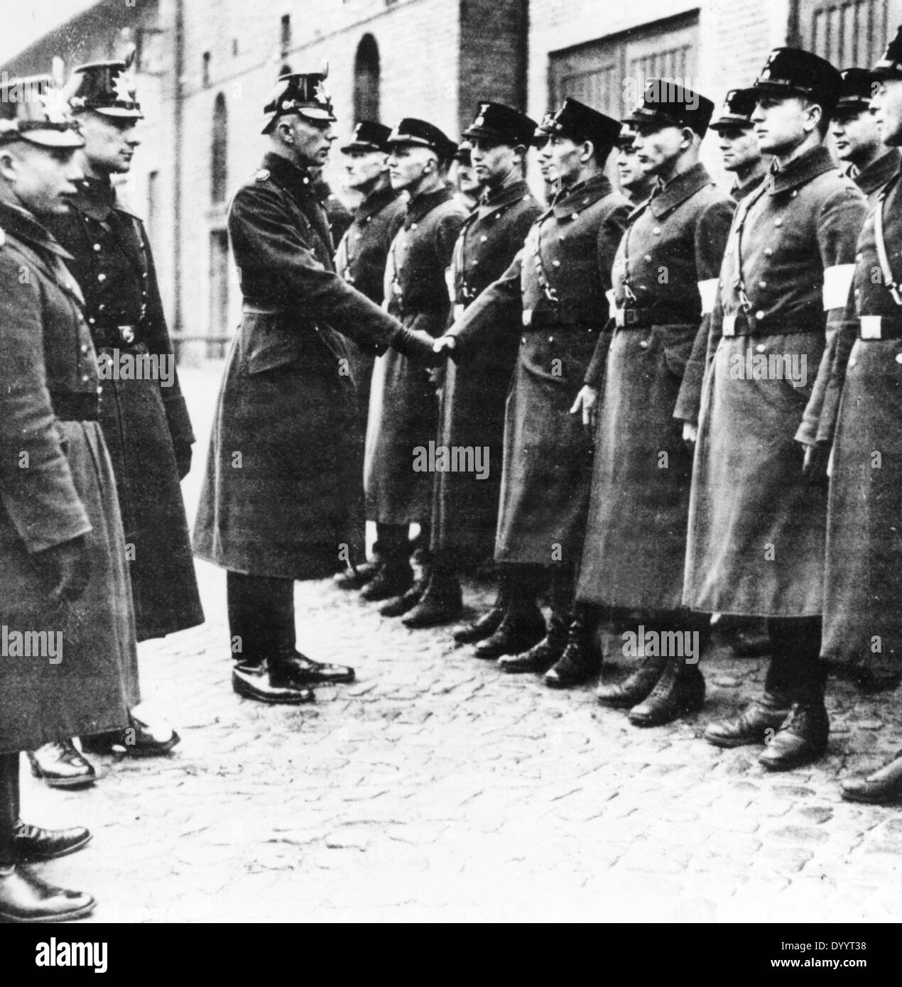 SS ans SA men during their swearing in as police constables, 1933 Stock Photo