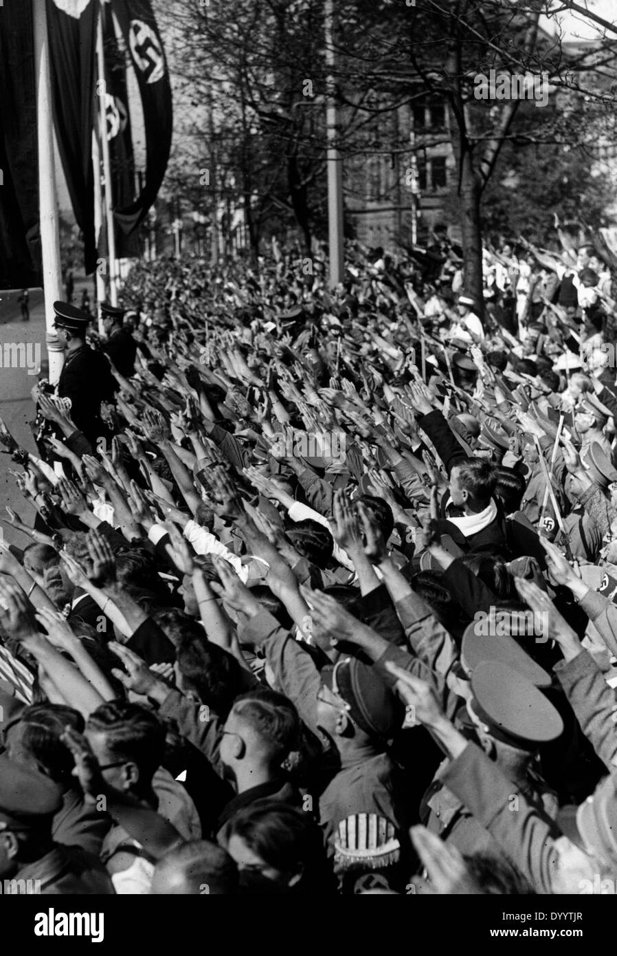 Cheering crowd outside the Hotel Deutscher Hof in Nuremberg, 1937 Stock Photo