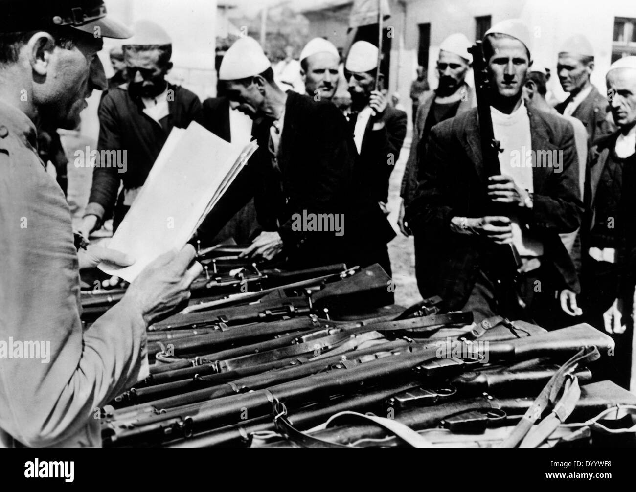 Arming Albanian fighters to combat partisans, 1944 Stock Photo
