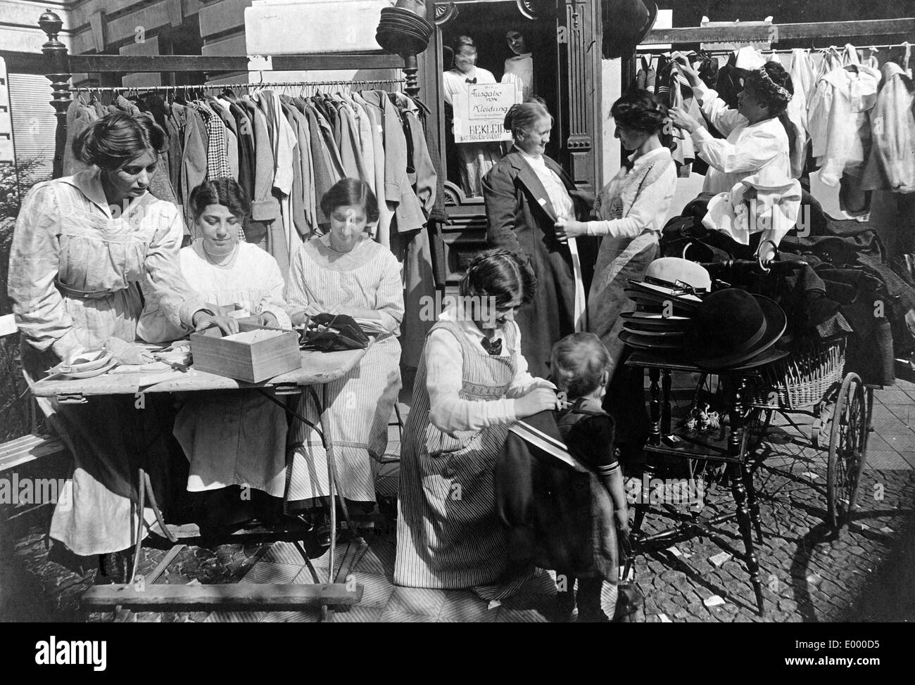 Distribution of clothes, 1914 Stock Photo Alamy