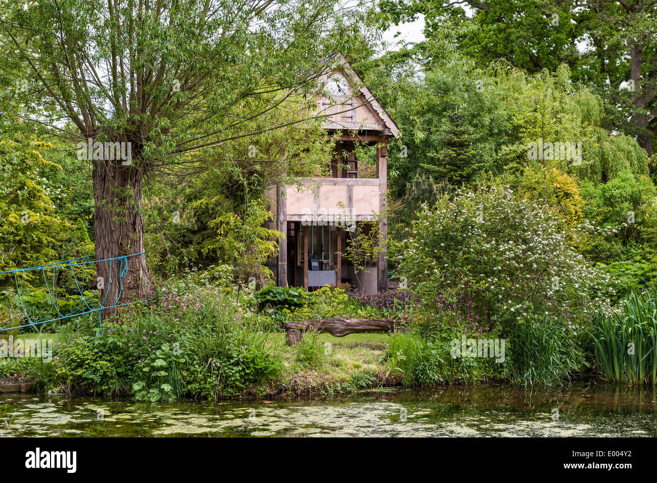 Westonbury Mill Water Gardens, Pembridge, Herefordshire. The giant cuckoo clock is powered by water Stock Photo
