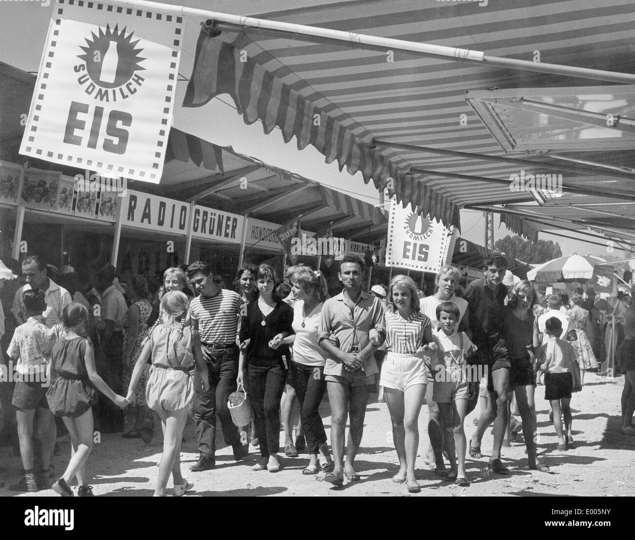 Passers-by in a shopping street, 1957 Stock Photo