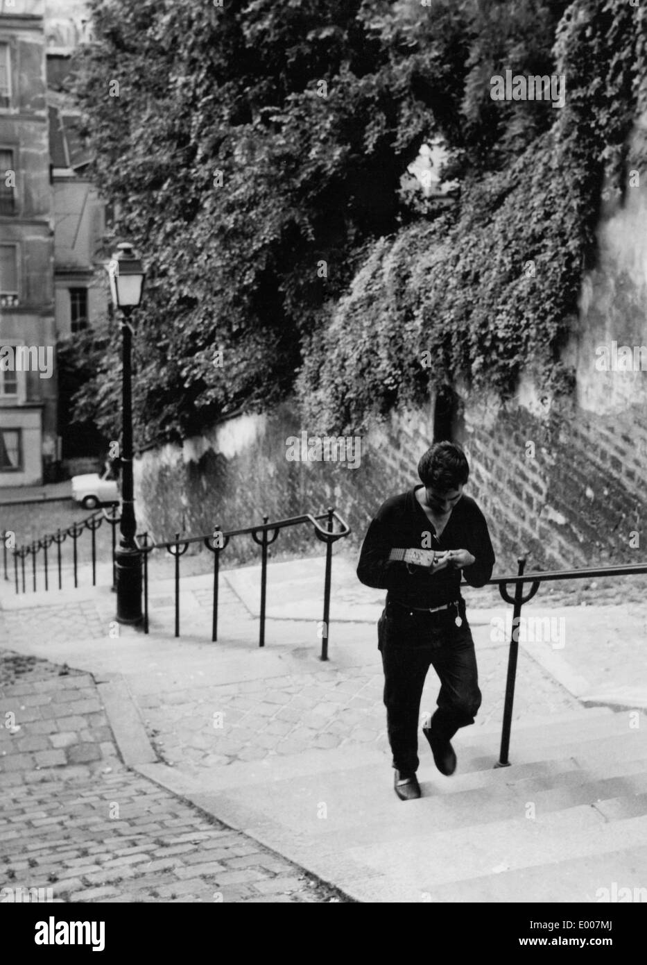 Man walking paris hi-res stock photography and images - Alamy
