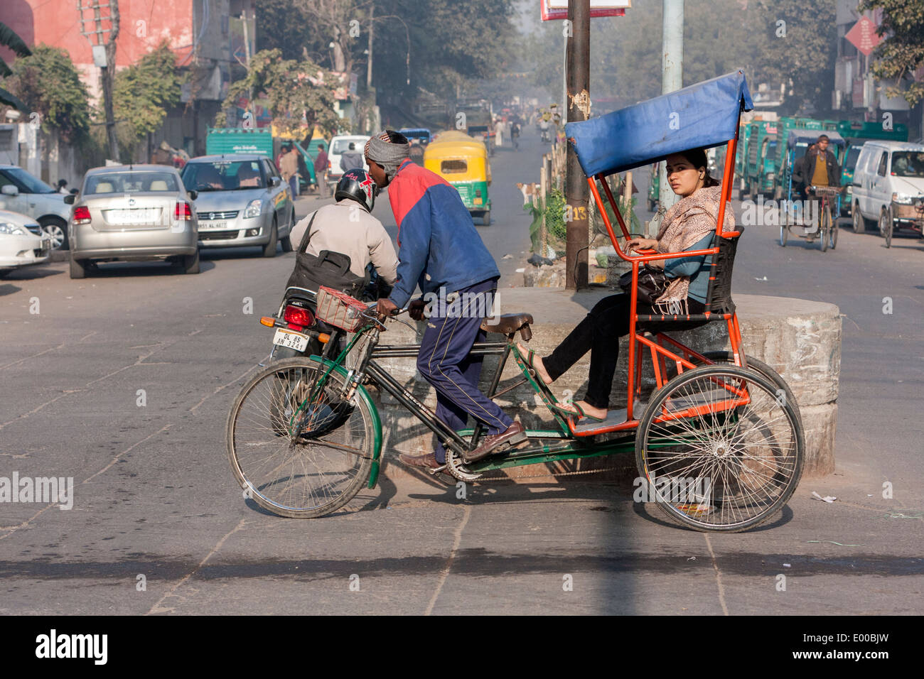 New Delhi, India. Rickshaw with Driver and Passenger. Stock Photo