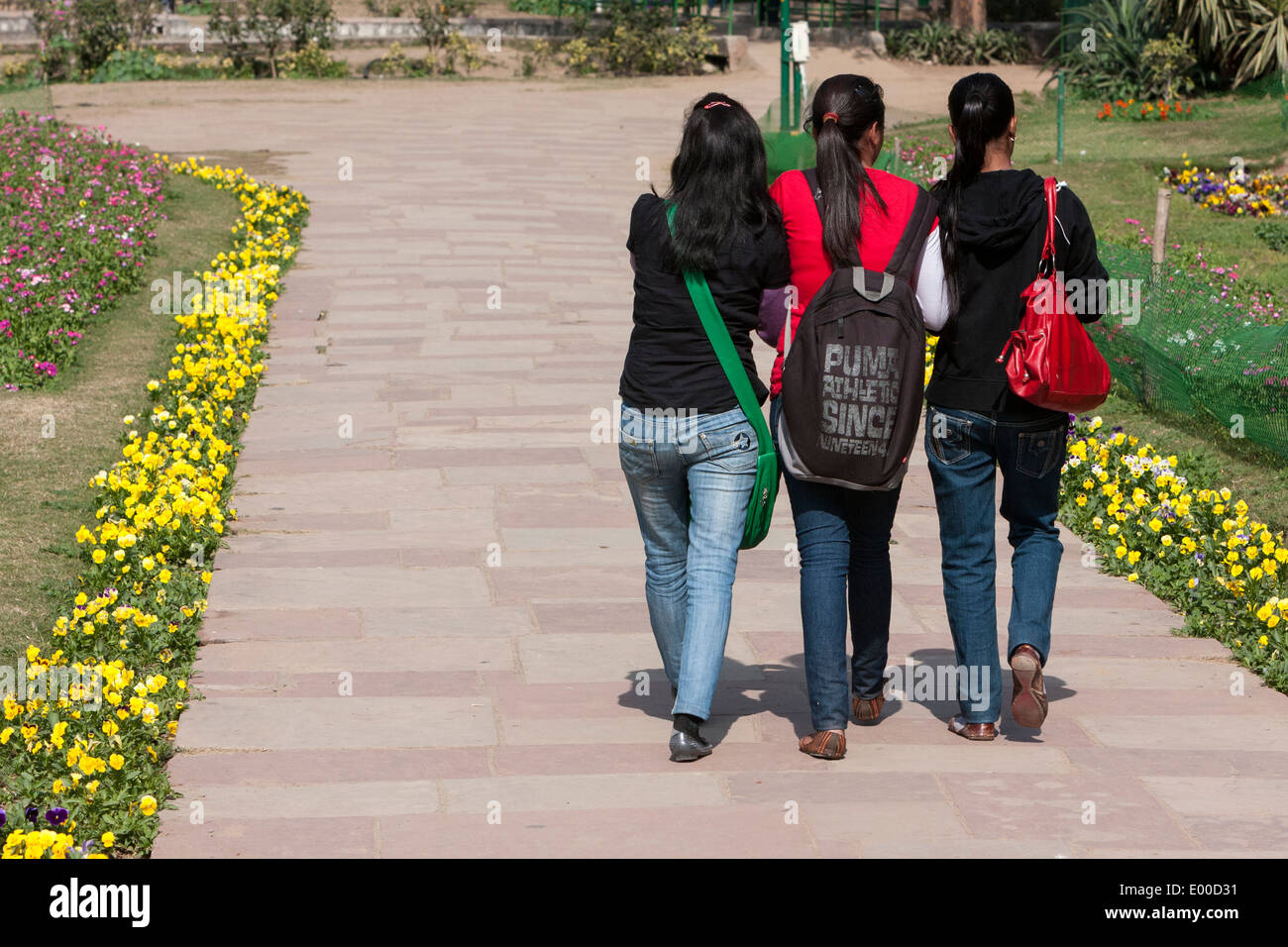 New Delhi, India. Young Indian Women weariung Blue Jeans, Lodi Gardens. Stock Photo