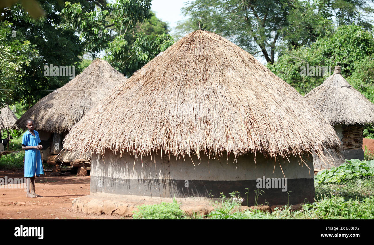 A young woman looks on in a rural area of the Lira district in northern Uganda. Stock Photo