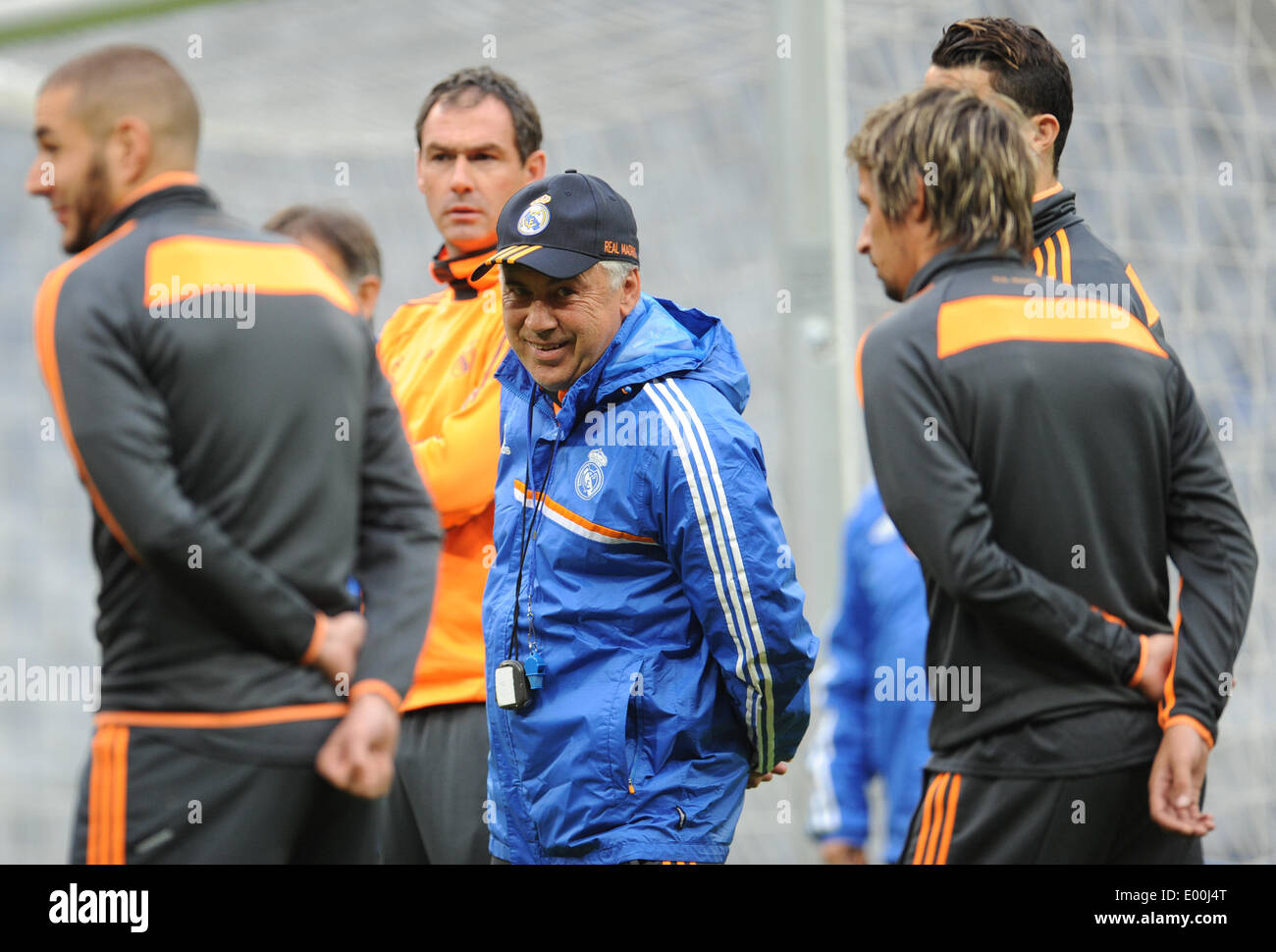 Munich, Germany. 28th Apr, 2014. Madrid's head coach Carlo Ancelotti (C) stands between his players Karim Benzema (L-R), Fabio Coentrao and Cristiano Ronaldo during a training session of Spanish soccer club Real Madrid at Allianz Arena in Munich, Germany, 28 April 2014. Real Madrid faces Bayern Munich in the UEFA Champions League semifinals second leg match on 29 April 2014. Photo: ANDREAS GEBERT/DPA/Alamy Live News Stock Photo