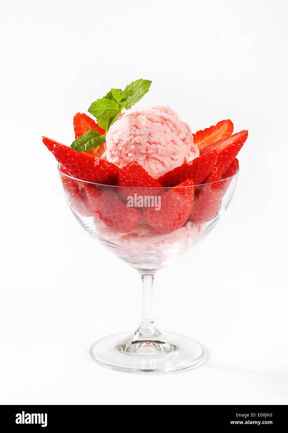 Ice cream with fresh strawberries in a coupe Stock Photo