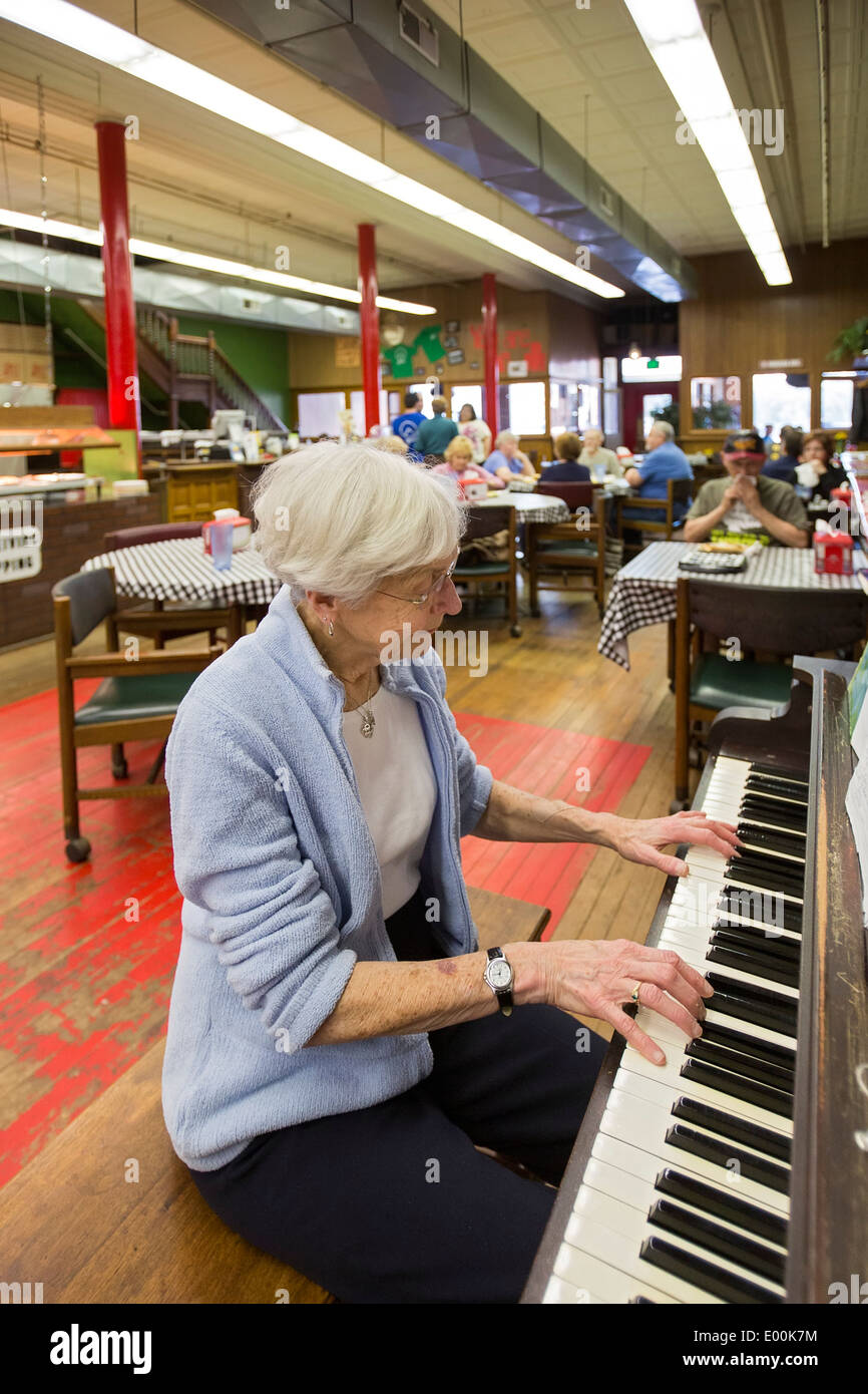 83-Year-Old Woman Plays Piano in Pizza Restaurant Stock Photo - Alamy