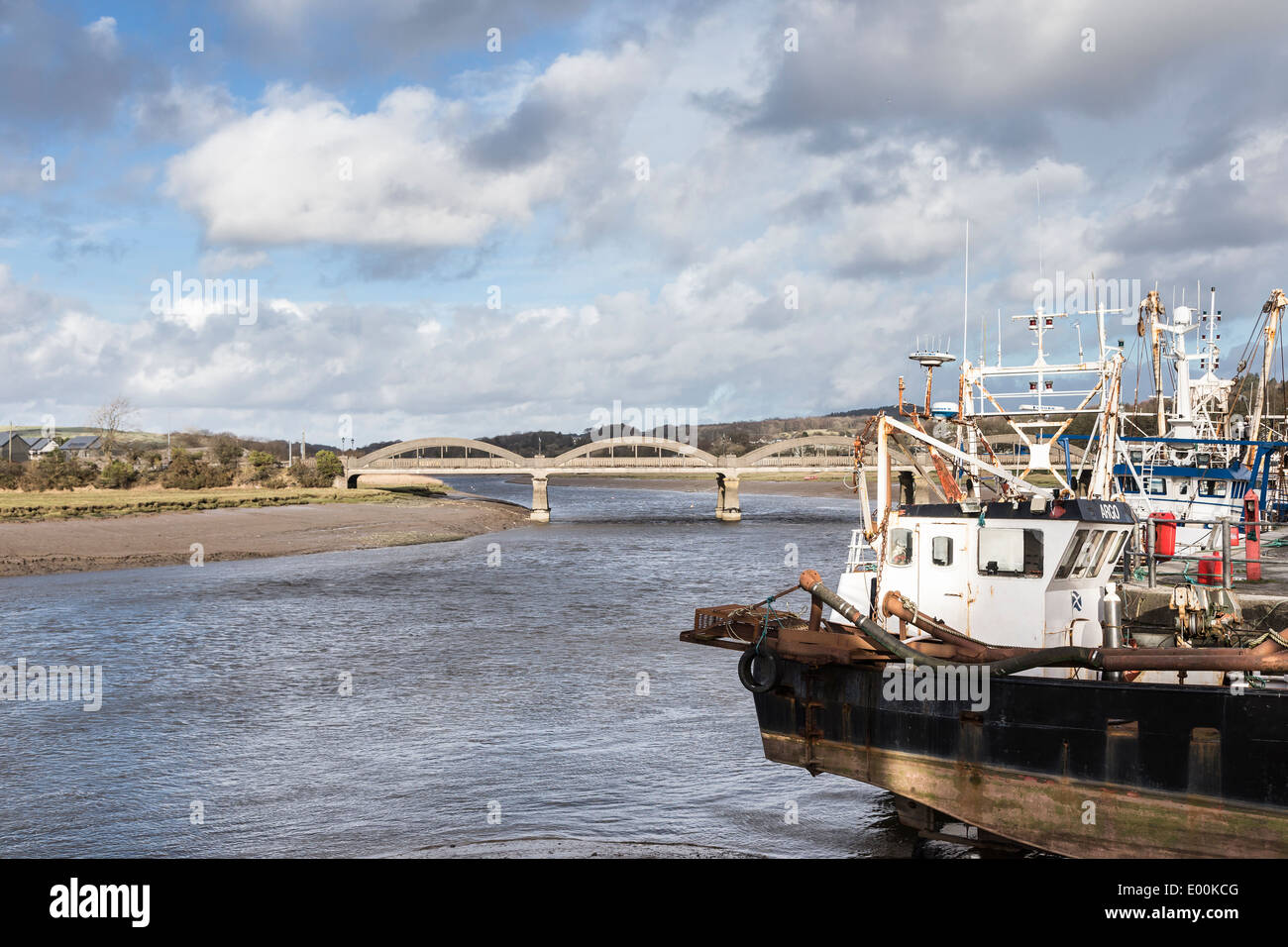 Fishing boats & bridge on Dee Estuary in Kirkcudbright. Stock Photo