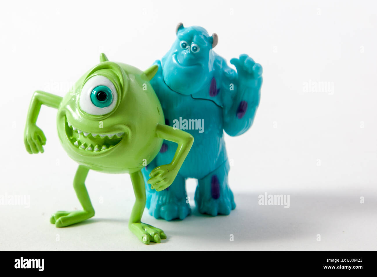 Plastic figures of Mike Wazowski and James P Sullivan from Monsters Inc, the childrens disney film Stock Photo