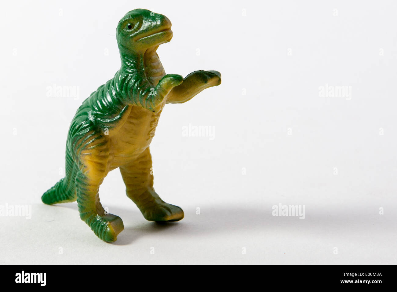 Plastic toys and figures from a play set, dinosaurs, farm animals and zoo animals Stock Photo