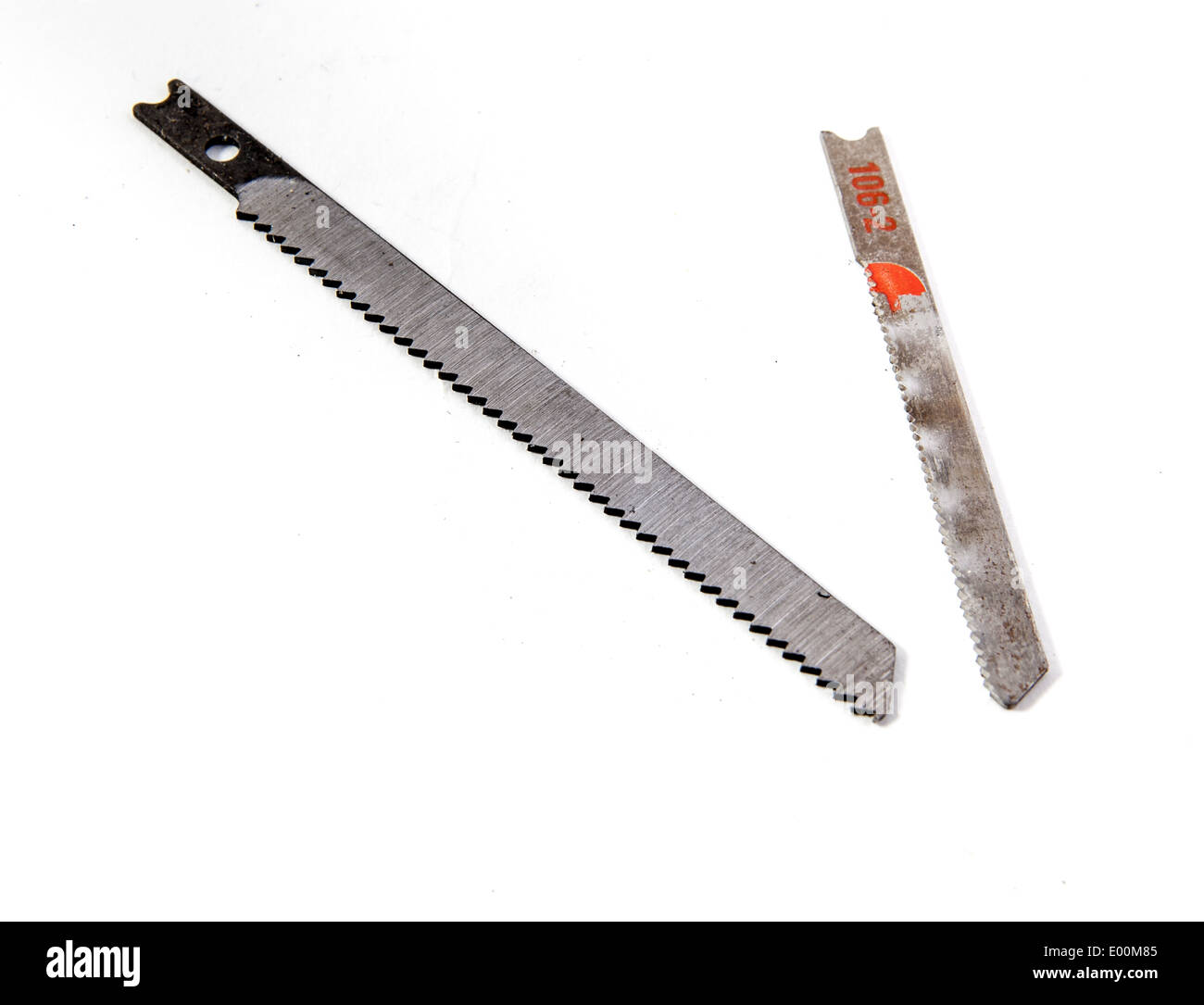 Two different sized jigsaw blades Stock Photo Alamy