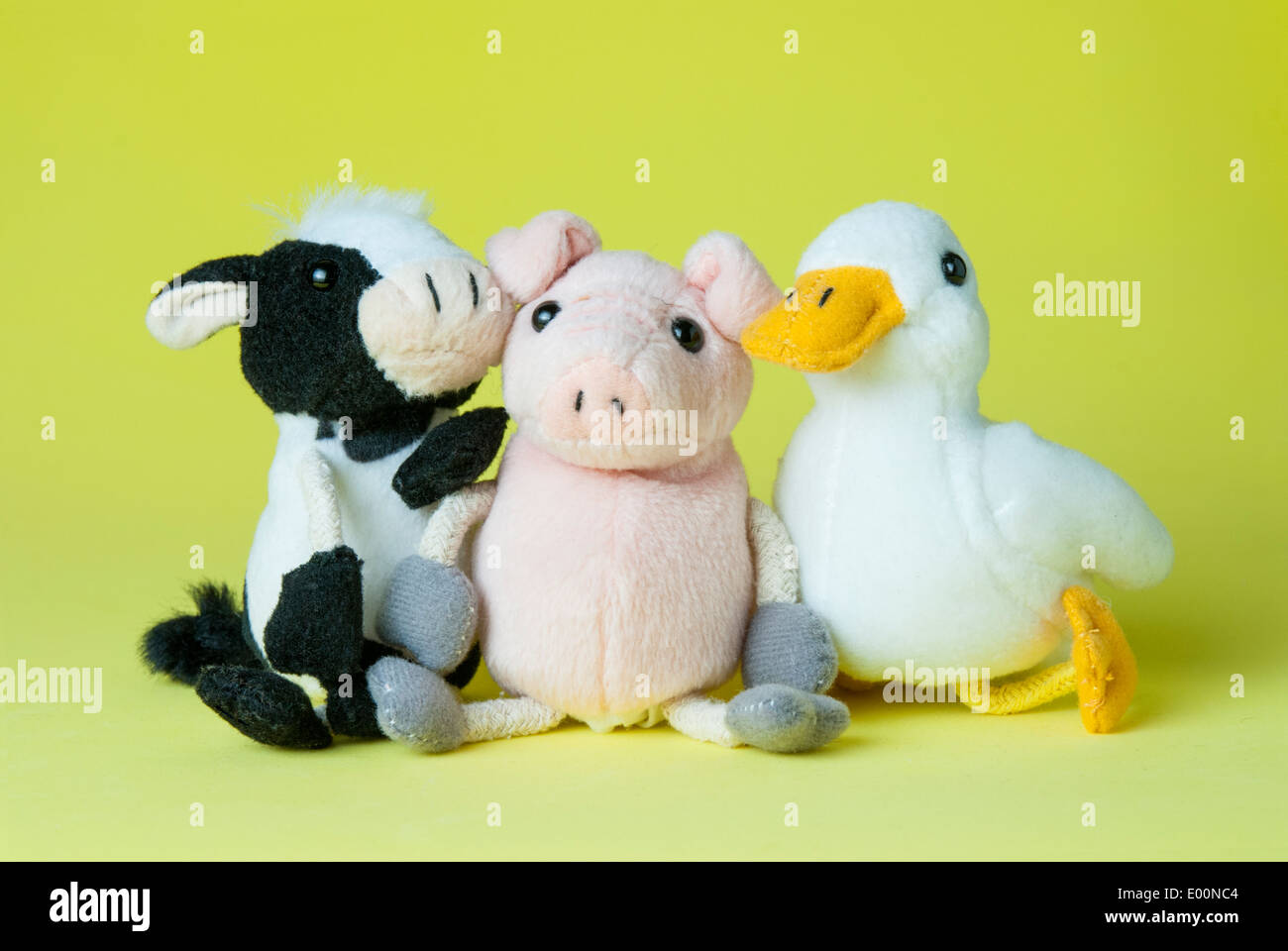 Three chilldren's soft toy farm animals Stock Photo