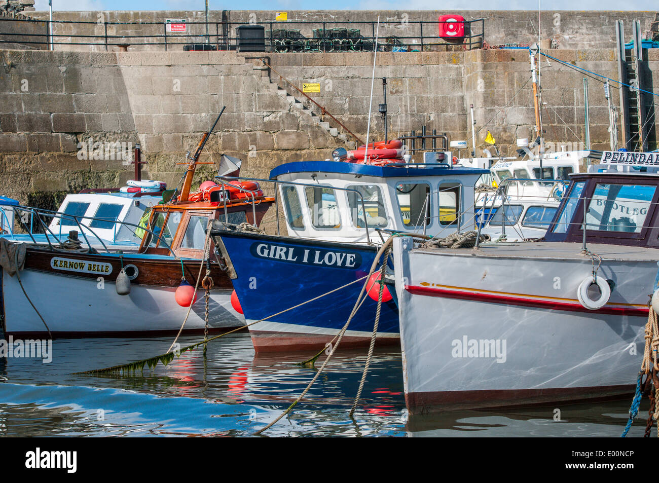 Fishing boats moored in Newquay harbour in England Cornwall Stock Photo