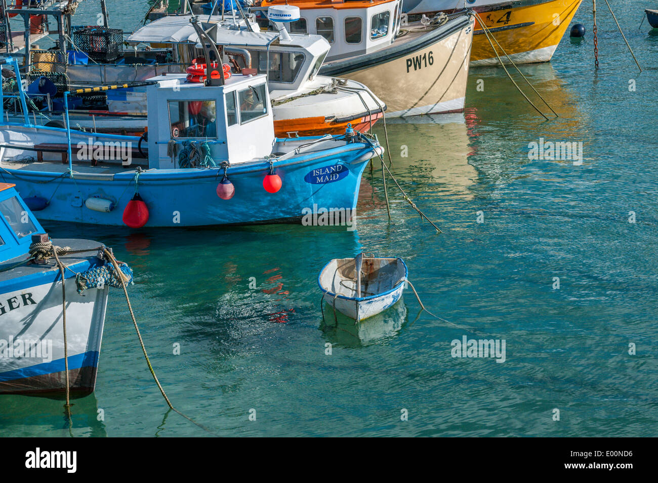 Fishing vessels moored in Newquay harbour in Cornwall England Stock Photo