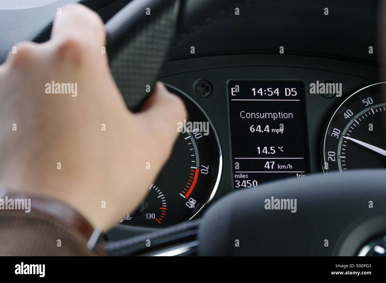 Fuel consumption computer screen displaying high MPG in a Skoda Fabia vRS Stock Photo