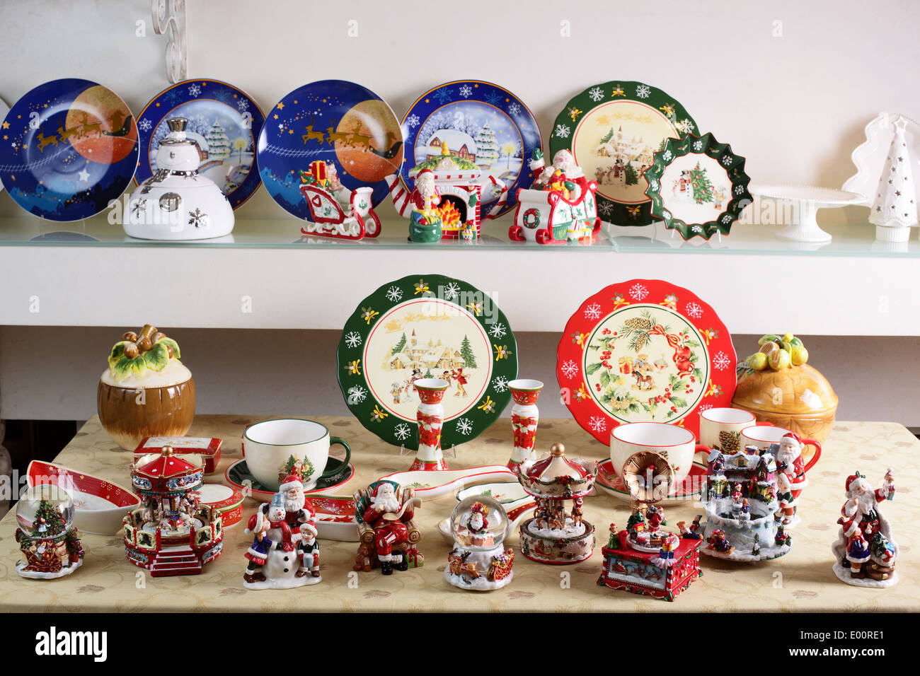 Shelf with different brand new hollyday dishes Stock Photo