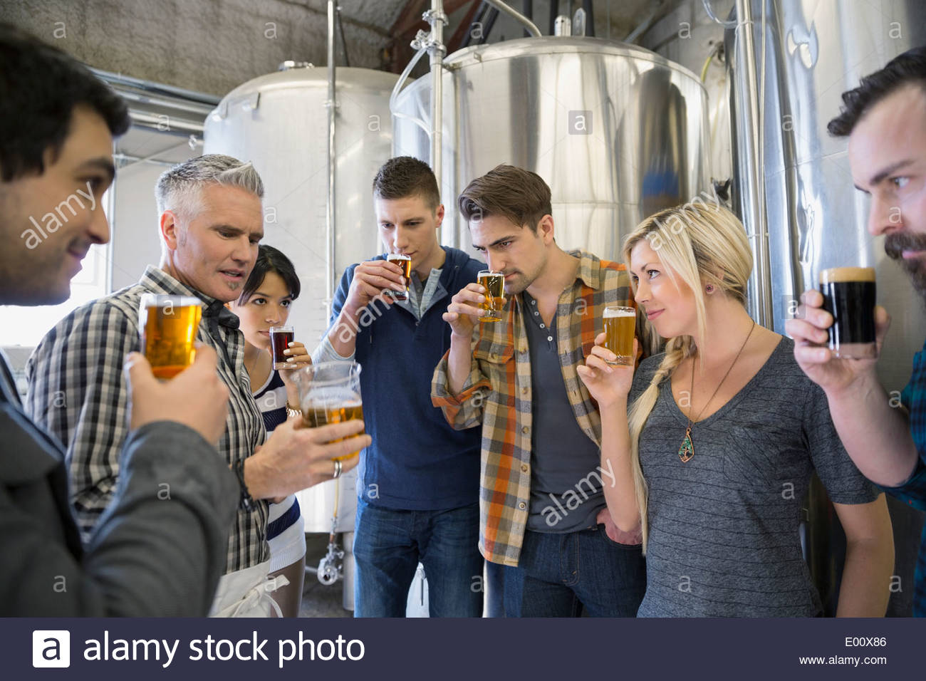 Friends beer tasting at brewery Stock Photo
