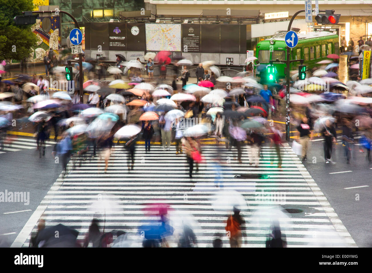 Pedestrians cross at Shibuya Crossing Stock Photo - Alamy