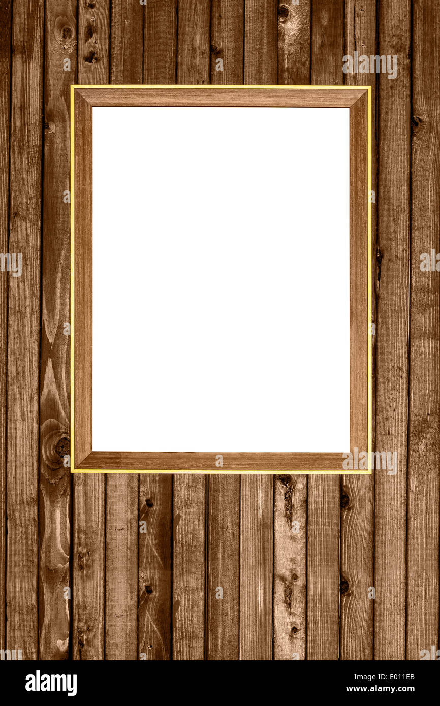 wooden photo frame hanging on old wood wall Stock Photo