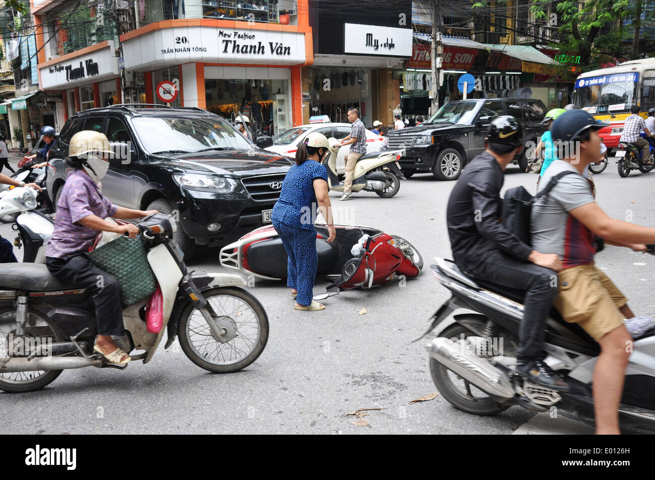 Traffic accident between car and motorbike in Hanoi, capital of Vietnam Stock Photo