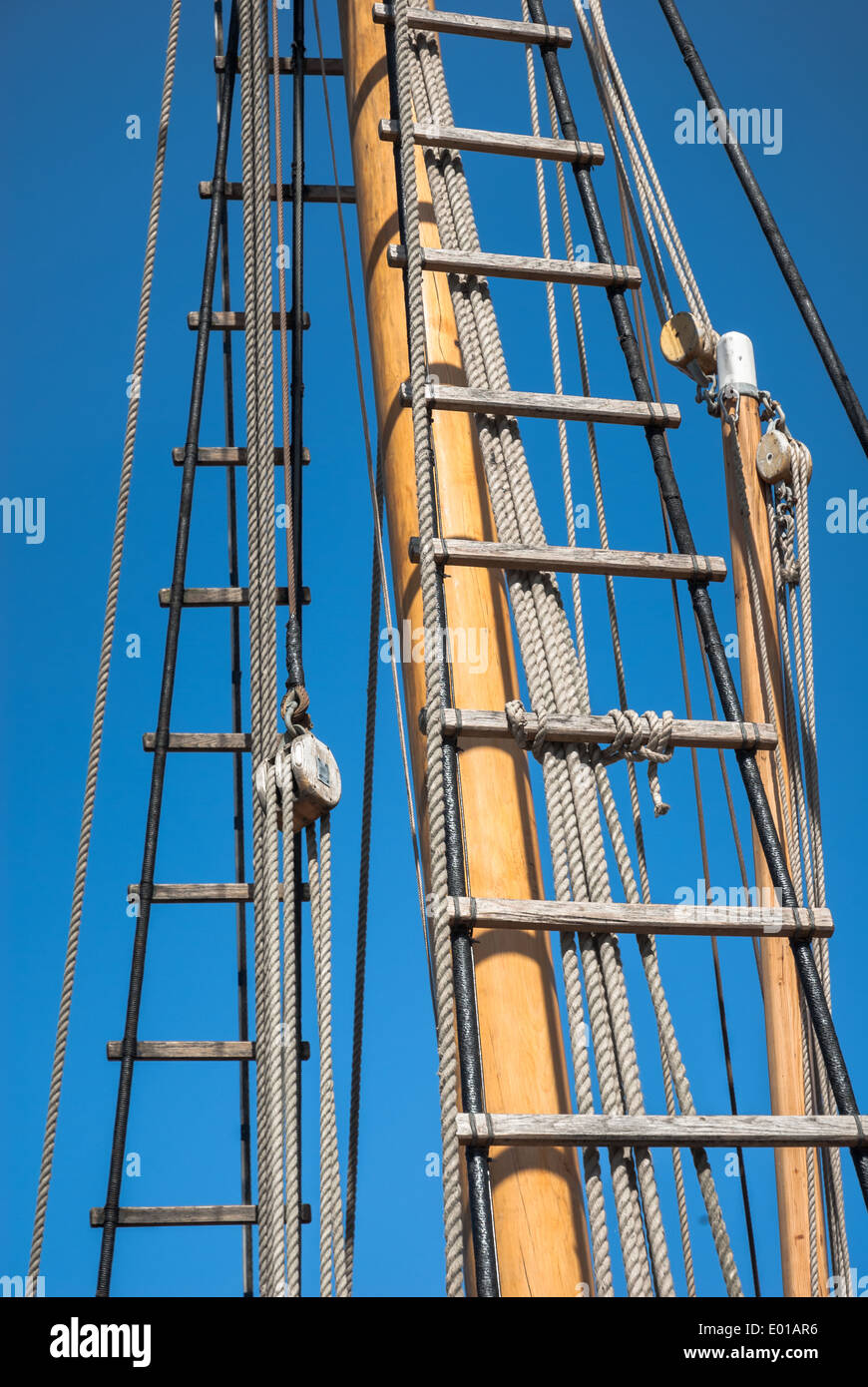 Detail of a ship's wooden mast and rigging. Stock Photo