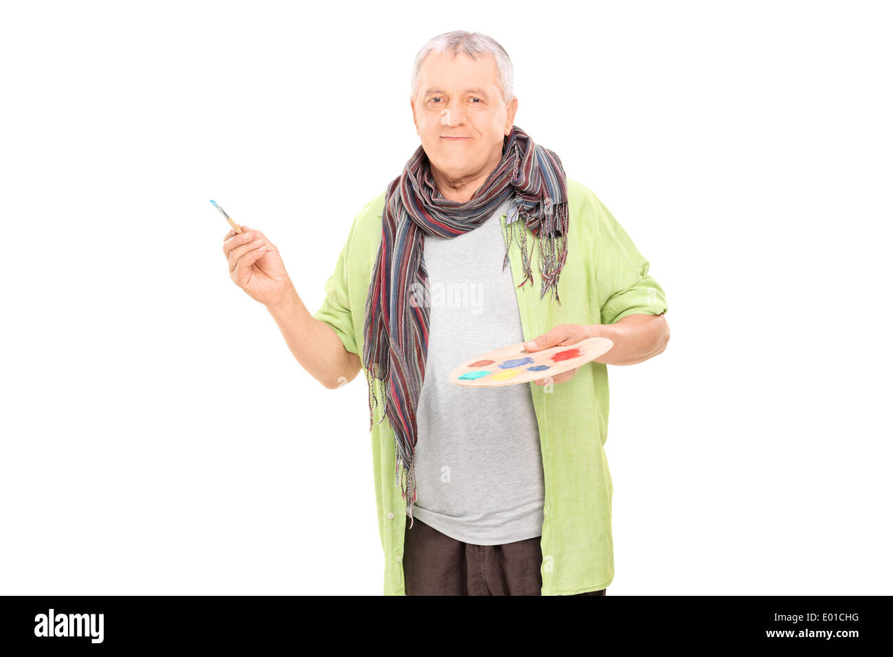 Mature male artist holding a color pallet Stock Photo - Alamy