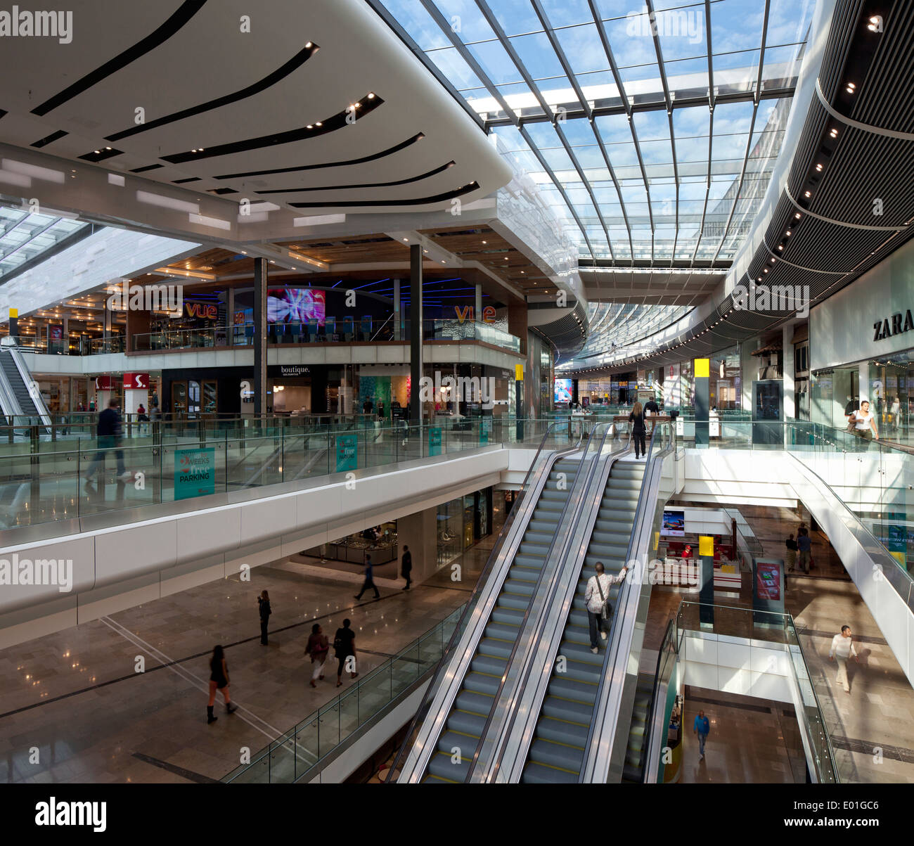 Shoppers ride an escalator up to the Harris Scarfe department store in  Adelaide, South Australia, Australia Stock Photo - Alamy