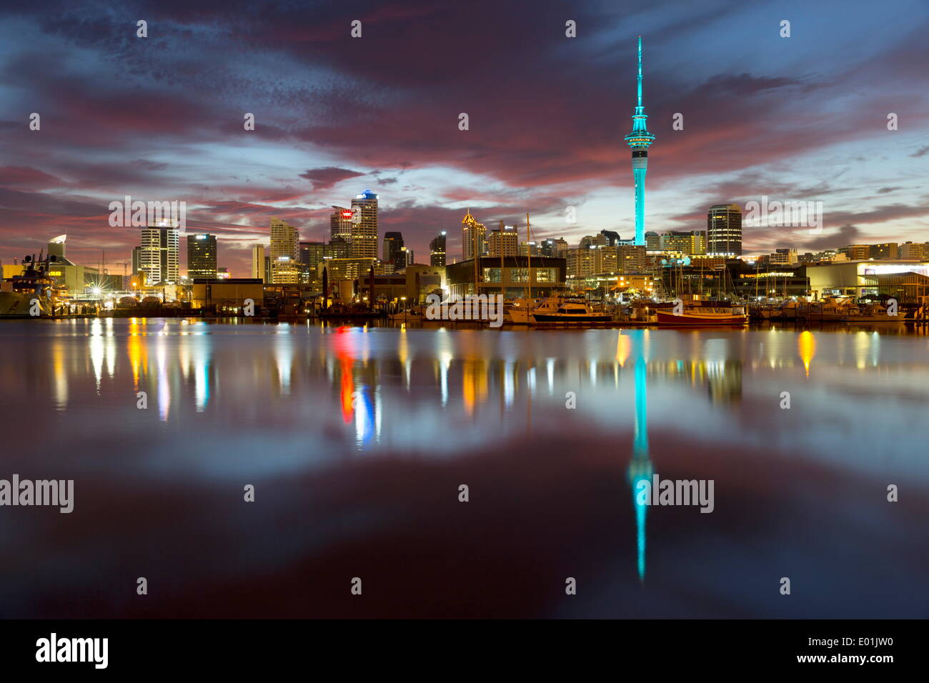 Sky Tower and city at dawn from Westhaven Marina, Auckland, North Island, New Zealand, Pacific Stock Photo