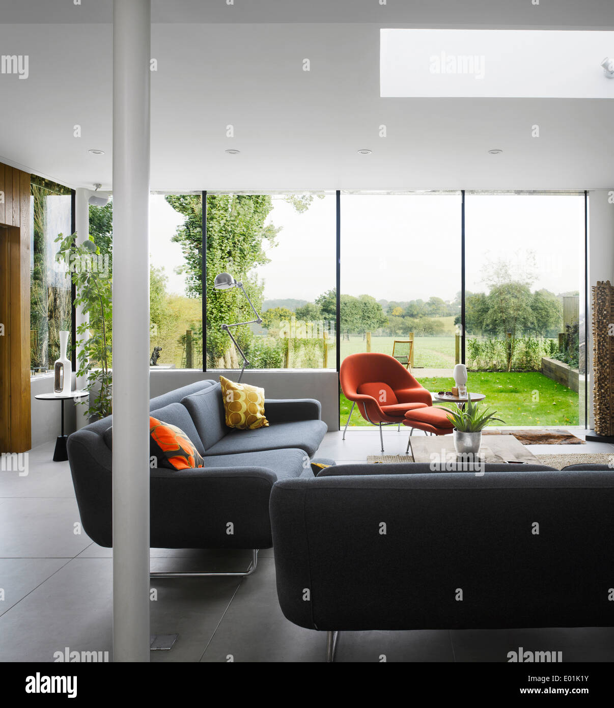 View from living room over garden in High Barnet family home, London by Paul Archer Design Stock Photo
