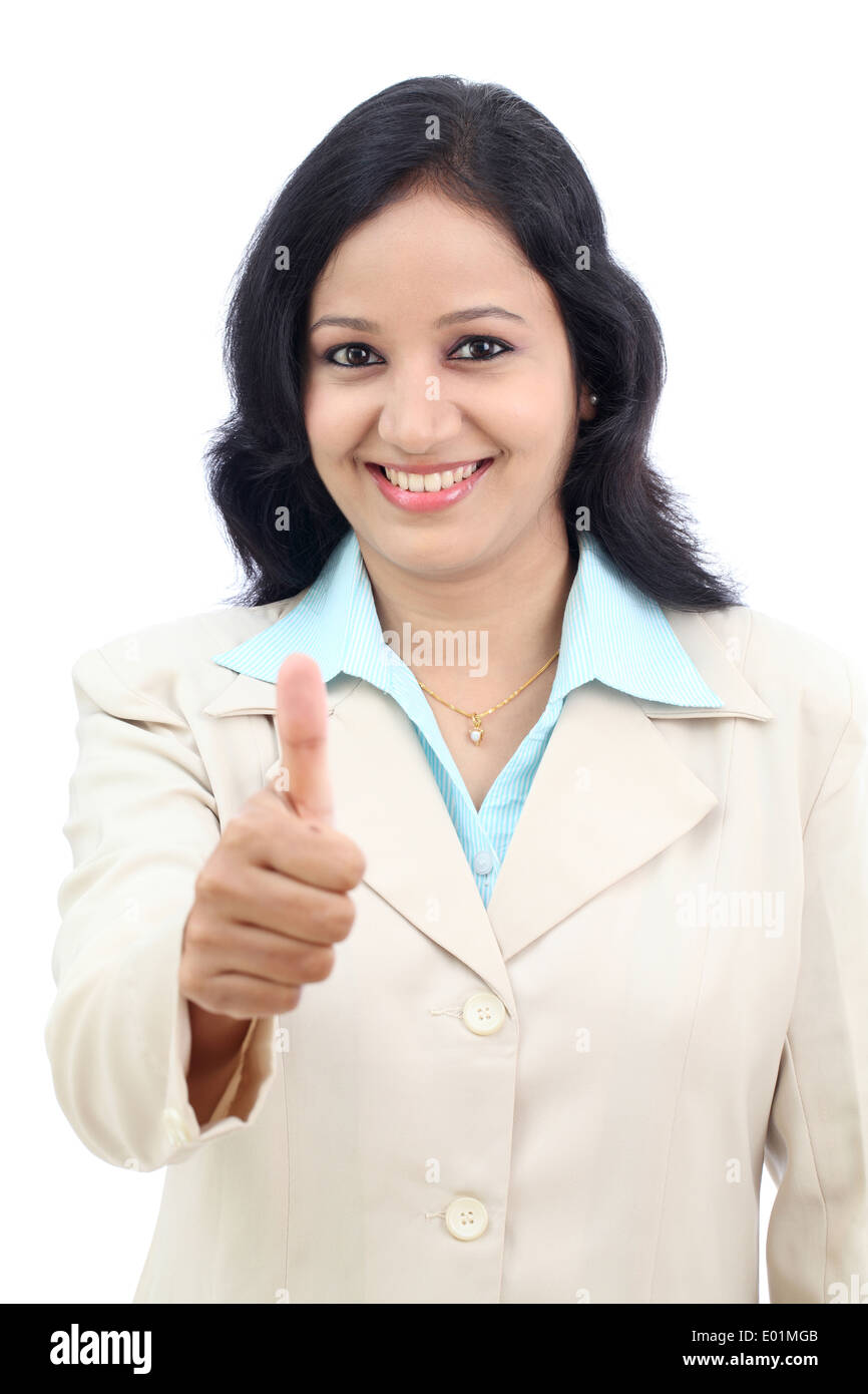 Young businesswoman showing thumbs up isolated against white background ...