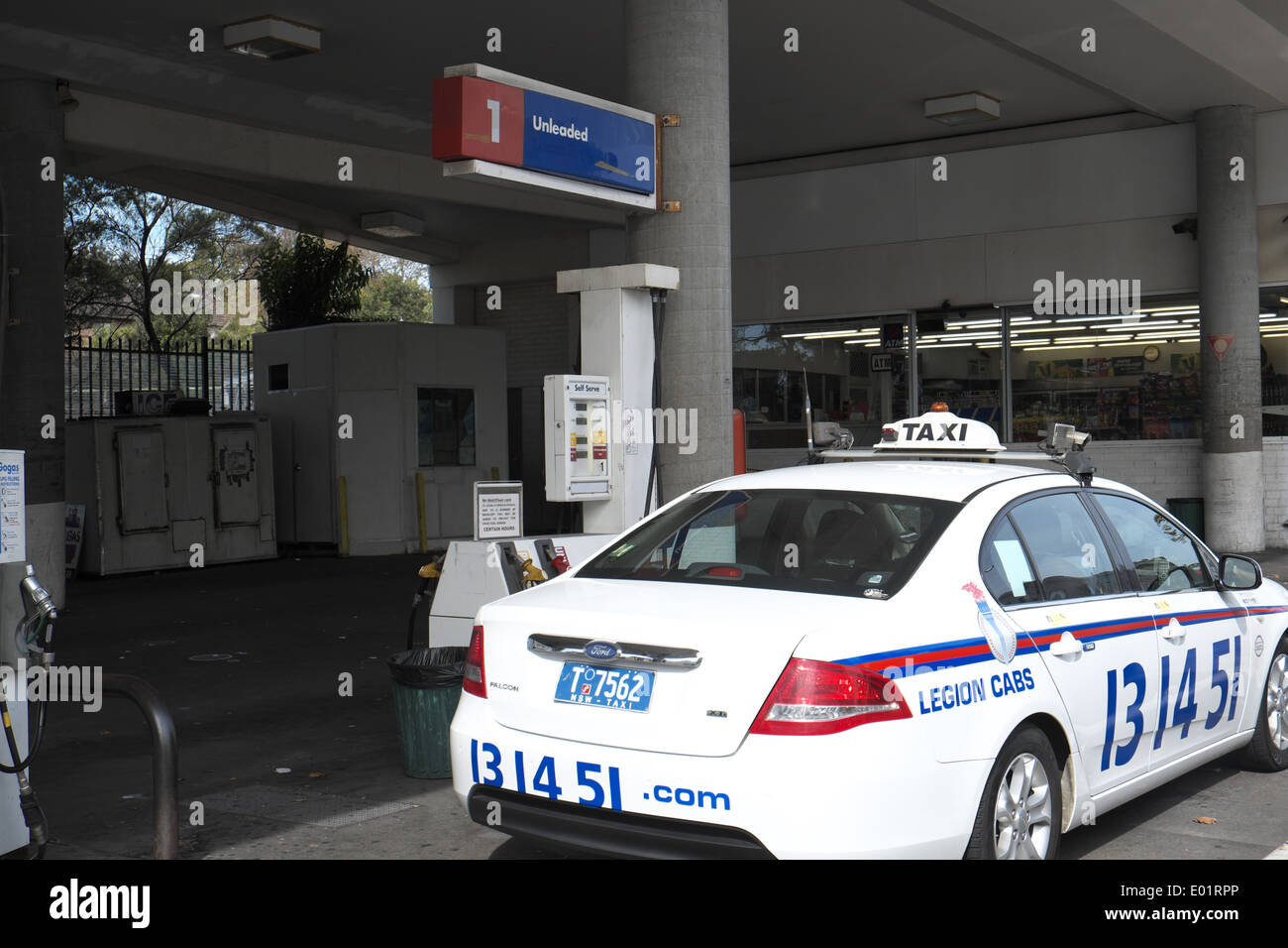 sydney taxi filling up with fuel LPG at a fuel gas station in chippendale,sydney Stock Photo