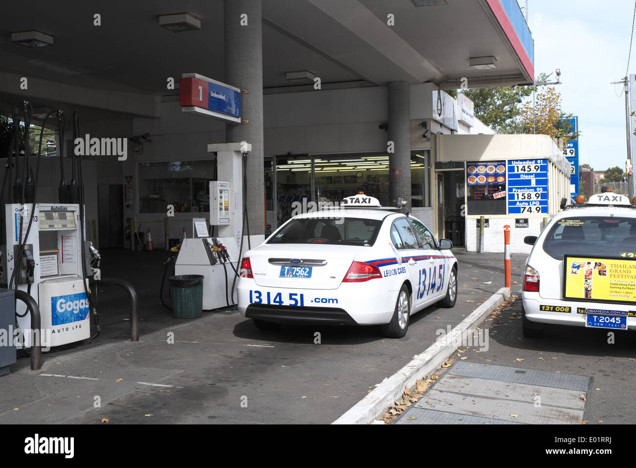 sydney taxi filling up with fuel LPG at a fuel gas station in chippendale,sydney Stock Photo