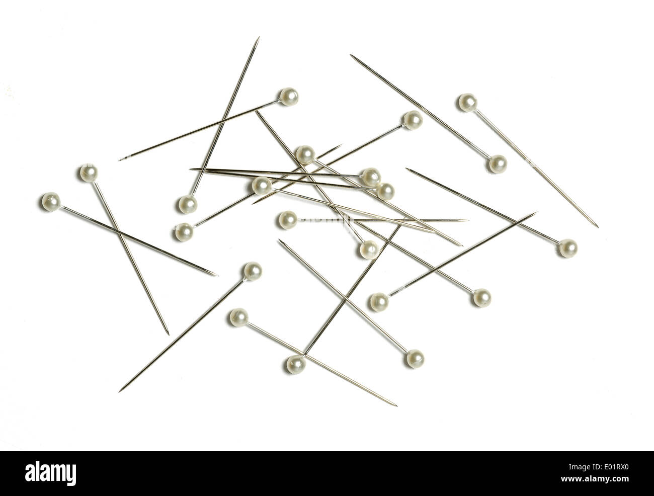 Pin Slanated Scattered pins on a white background Stock Photo - Alamy