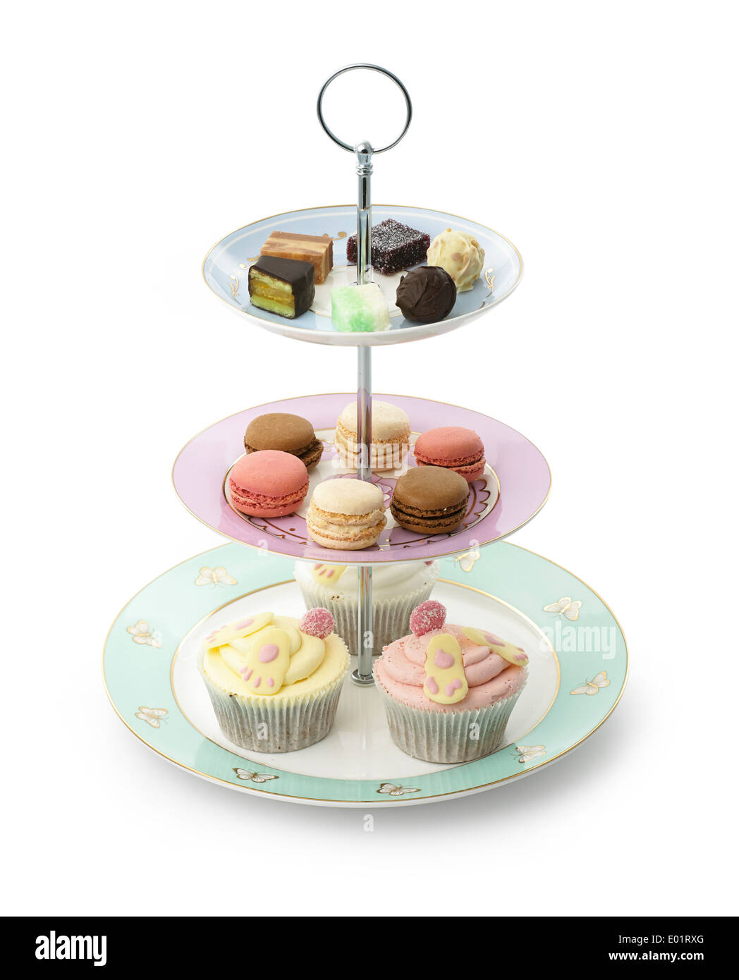 Cake stand with 3 tiers with sweet treats Stock Photo