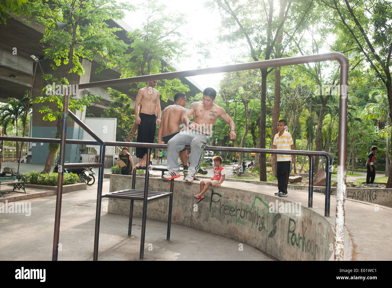 Babngkok, Thailand - Young men practicing freerunning Stock Photo